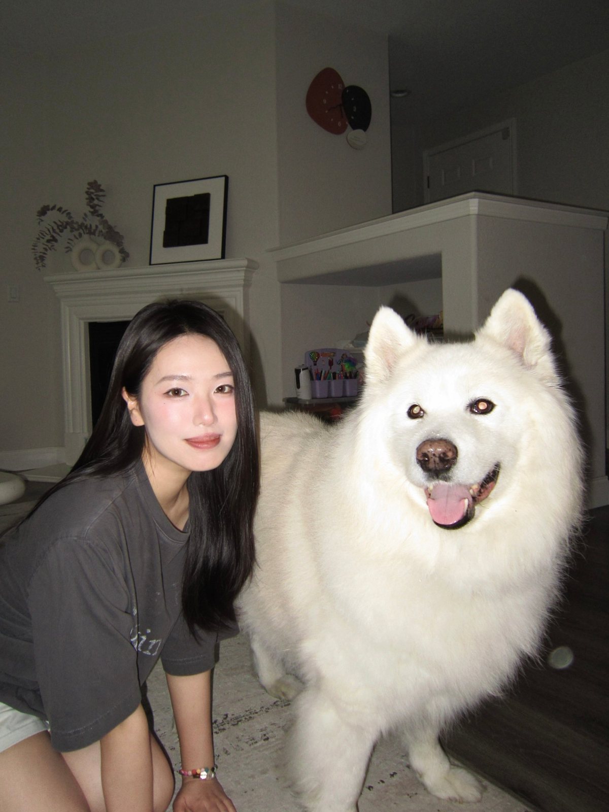 Wenxin with a big white Samoyed